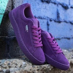 Purple puma sneakers